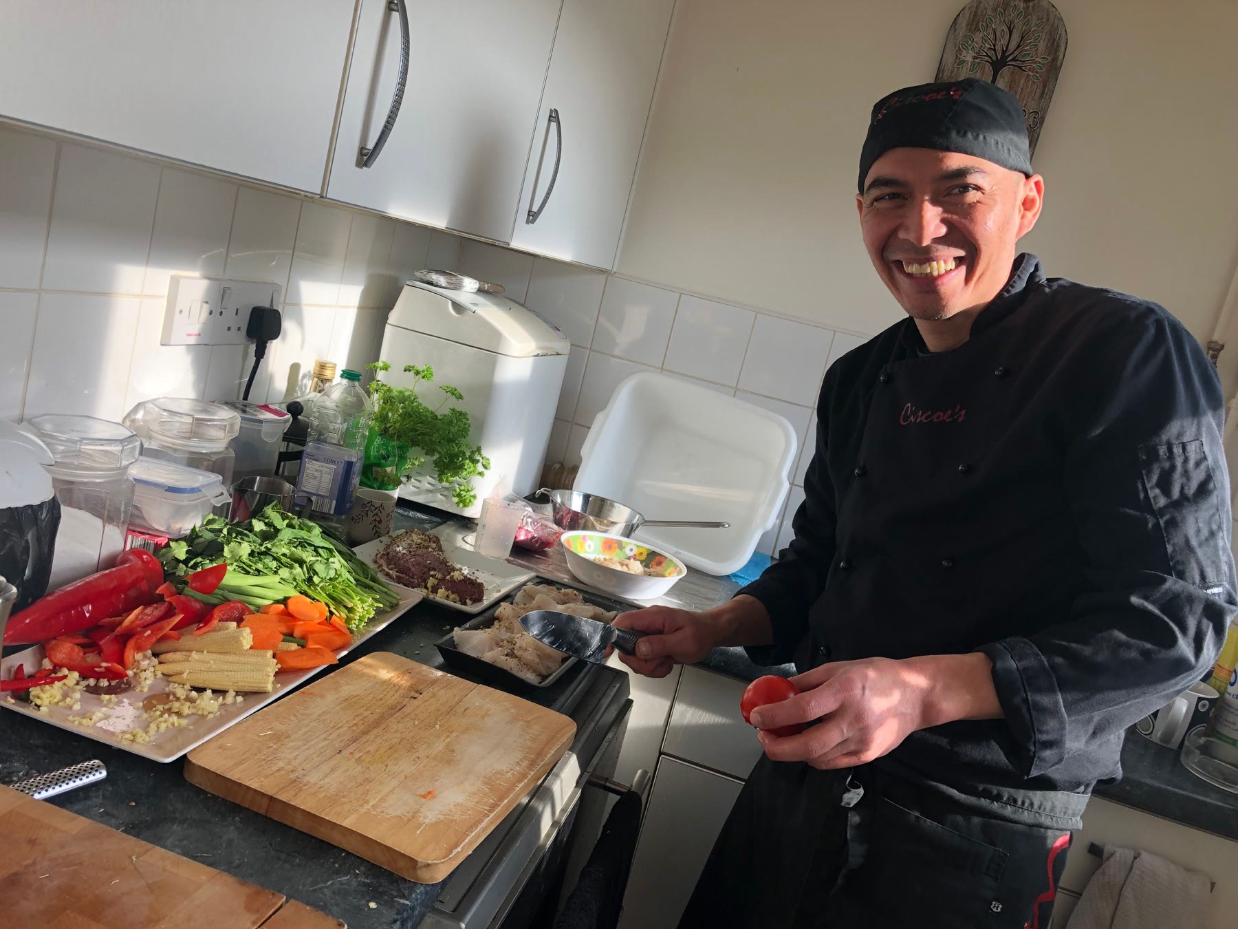 Chef Cisco preparing ingredients in a private kitchen