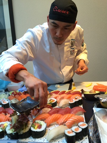 Chef Cisco finishing a generous sushi platter