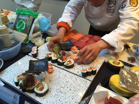 Chef Cisco arranging a competition sushi platter by hand