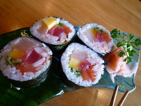 Fresh salmon and tuna maki with mango and cucumber