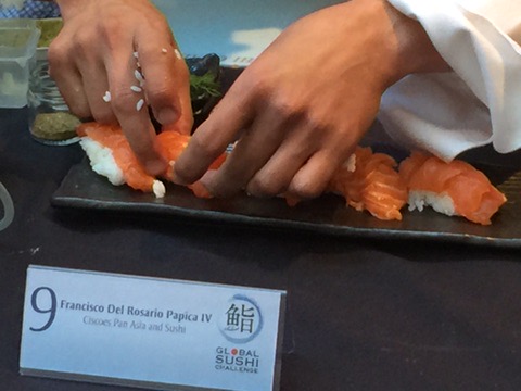 Chef Cisco preparing salmon nigiri at the Global Sushi Challenge